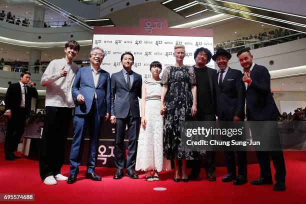 Bong Joon Ho, Tilda Swinton, An Seo Hyun, Steven Yeun, Byun Heebong, Woo Shik Choi, Giancarlo Esposito and Daniel Henshall attend the Korean Red...