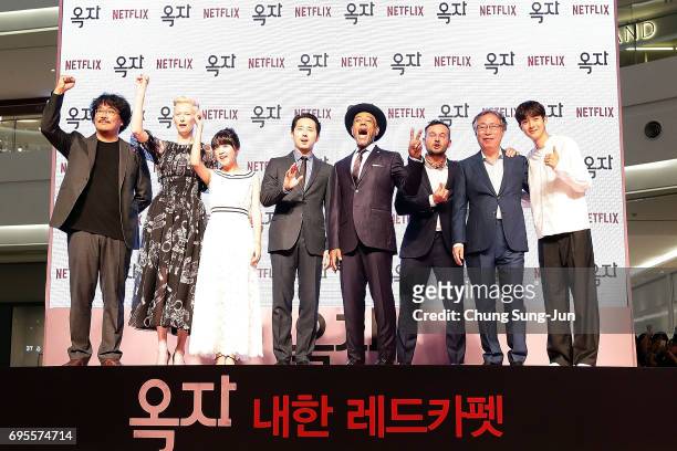 Bong Joon Ho, Tilda Swinton, An Seo Hyun, Steven Yeun, Byun Heebong, Woo Shik Choi, Giancarlo Esposito and Daniel Henshall attend the Korean Red...
