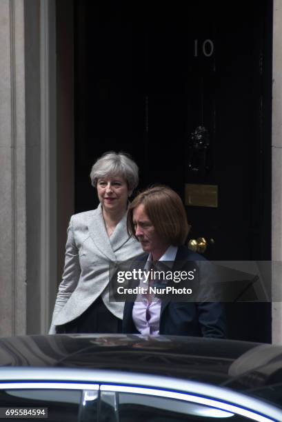 British Prime Minister, Theresa May, leaves 10 Downing Street after a talk with Democratic Unionist Party , Arlene Foster, London on June 13, 2017....