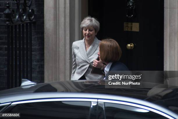 British Prime Minister, Theresa May, leaves 10 Downing Street after a talk with Democratic Unionist Party , Arlene Foster, London on June 13, 2017....