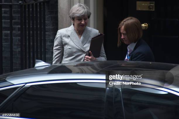 British Prime Minister, Theresa May, leaves 10 Downing Street after a talk with Democratic Unionist Party , Arlene Foster, London on June 13, 2017....