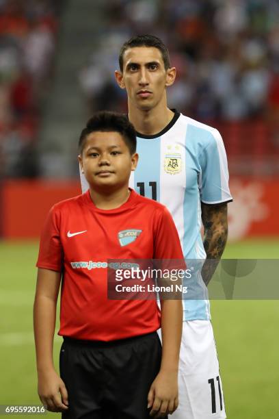 Angel Di Maria of Argentina looks on before the international friendly match between Argentina and Singapore at National Stadium on June 13, 2017 in...