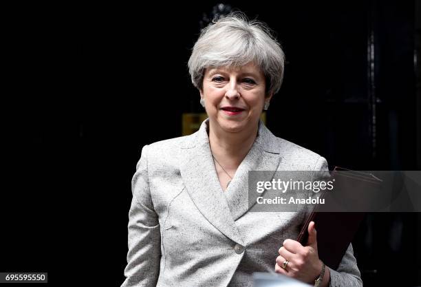 British Prime Minister Theresa May leaves after meeting Democratic Unionist Party leader Arlene Foster at 10 Downing Street in London, United Kingdom...