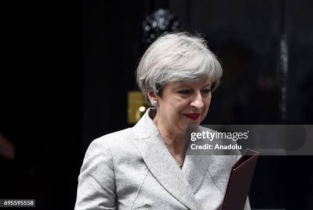 British Prime Minister Theresa May leaves after meeting Democratic Unionist Party leader Arlene Foster at 10 Downing Street in London, United Kingdom...