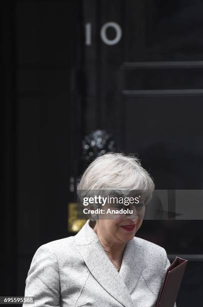 British Prime Minister Theresa May leaves after meeting Democratic Unionist Party leader Arlene Foster at 10 Downing Street in London, United Kingdom...