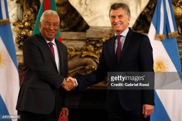 Prime Minister of Portugal Antonio Costa and President of Argentina Mauricio Macri shake hands during a press conference as part of an official visit...