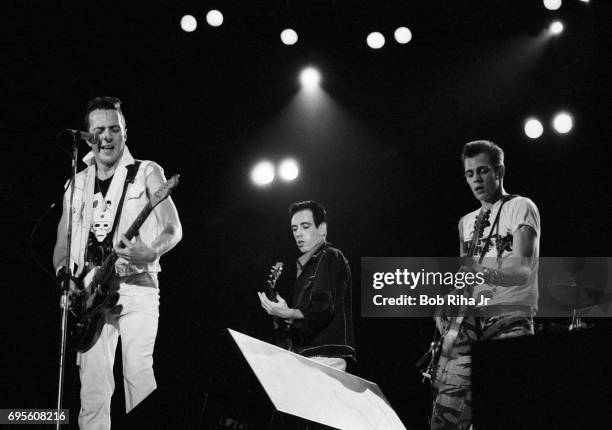 English group the Clash perform onstage during the US Festival at Glen Helen Regional Park, Devore, California, May 28, 1983. Pictured are, from...