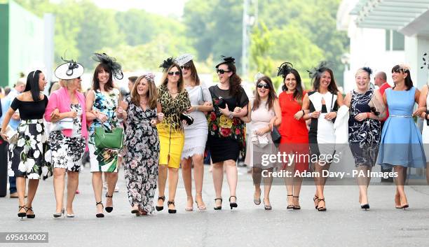 Female racegoers on Ladies Day during the 2017 Investec Epsom Derby Festival at Epsom Racecourse, Epsom.