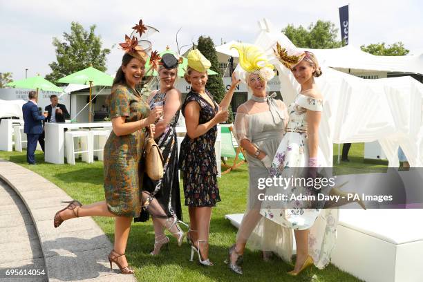 Female racegoers on Ladies Day during the 2017 Investec Epsom Derby Festival at Epsom Racecourse, Epsom.