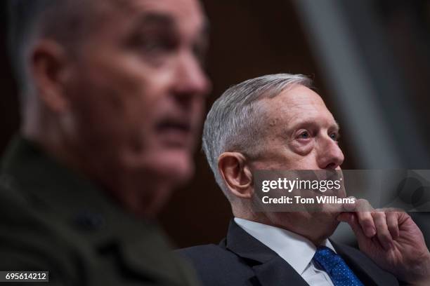 Defense Secretary James Mattis, right, and Chairman of the Joint Chiefs of Staff Gen. Joseph Dunford, testify before a Senate Armed Services...