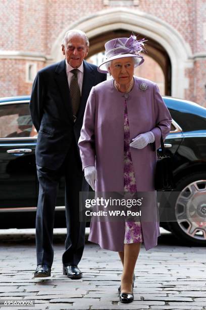 Queen Elizabeth II and Prince Philip, Duke of Edinburgh arrive to attend Evensong in celebration of the centenary of the Order of the Companions of...