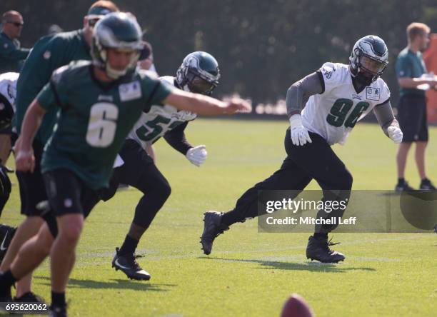 Derek Barnett of the Philadelphia Eagles runs down the field on a kickoff by Caleb Sturgis of the Philadelphia Eagles during mandatory minicamp at...
