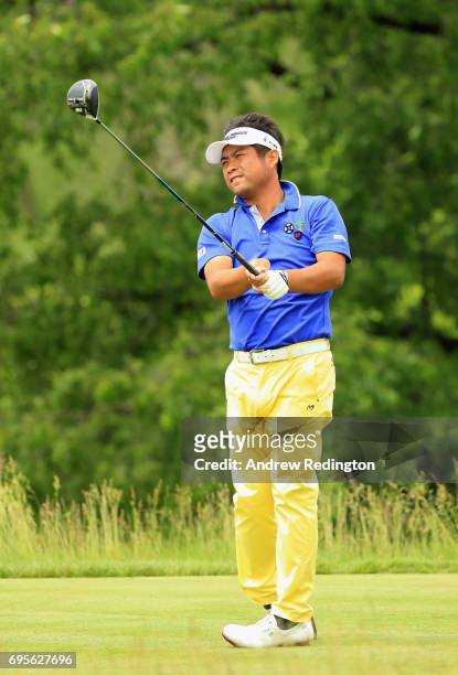 Yuta Ikeda of Japan plays his shot from the 17th tee during a practice round prior to the 2017 U.S. Open at Erin Hills on June 13, 2017 in Hartford,...