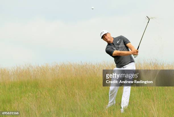 Alex Noren of Sweden plays his shot on the 16th hole during a practice round prior to the 2017 U.S. Open at Erin Hills on June 13, 2017 in Hartford,...