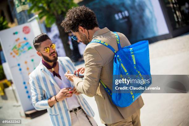 Guest wears a Ikea backpack during Pitti Immagine Uomo 92. At Fortezza Da Basso on June 13, 2017 in Florence, Italy.