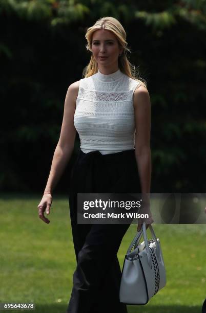 Ivanka Trump walks toward Marine One before departing with President Donald Trump from the White House on June 13, 2017 in Washington, DC. President...