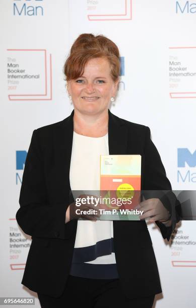 Author Dorthe Nors of Denmark with the book 'Mirror, Shoulder, Signal' at a photocall for the shortlisted authors and translators for the Man Booker...