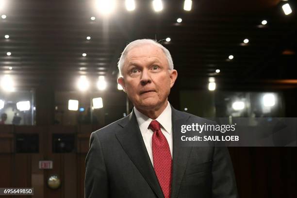 Attorney General Jeff Sessions arrives to testify during a US Senate Select Committee on Intelligence hearing on Capitol Hill in Washington, DC, June...