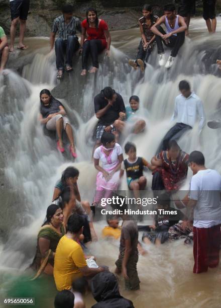 People having a gala time under water falls at Kanheri Caves on Sunday Morning.