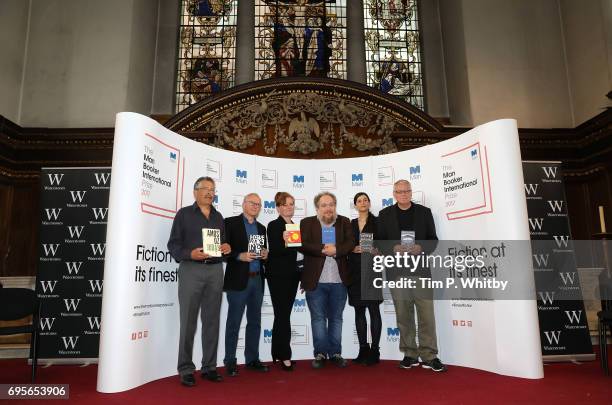 Translator Nicholas de Lange with authors David Grossman, Dorthe Nors, Mathias Enard, Samanta Schweblin and Roy Jacobsen at a photocall for the...