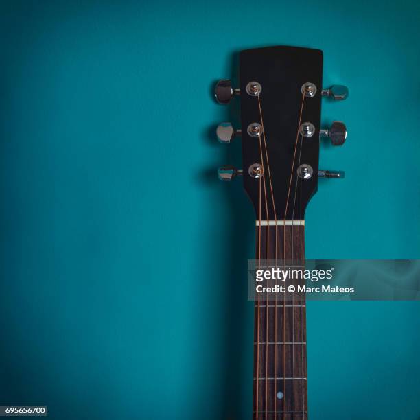guitar on a wall - marc mateos stock pictures, royalty-free photos & images