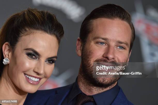 Actor Armie Hammer and wife Elizabeth Chambers Hammer arrive at the premiere of 'Cars 3' at Anaheim Convention Center on June 10, 2017 in Anaheim,...