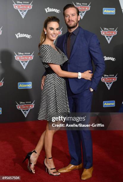 Actor Armie Hammer and wife Elizabeth Chambers Hammer arrive at the premiere of 'Cars 3' at Anaheim Convention Center on June 10, 2017 in Anaheim,...