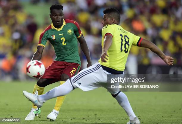 Colombia's defender Frank Fabra vies with Cameroon's defender Ernest Mabouka during the friendly football match Cameroon vs Colombia at the Col....