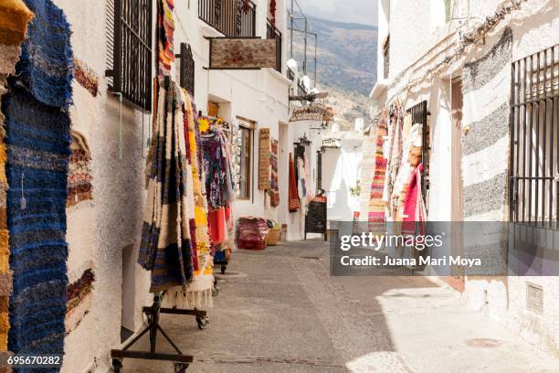 a street in alpujarra, granada - granada stock-fotos und bilder