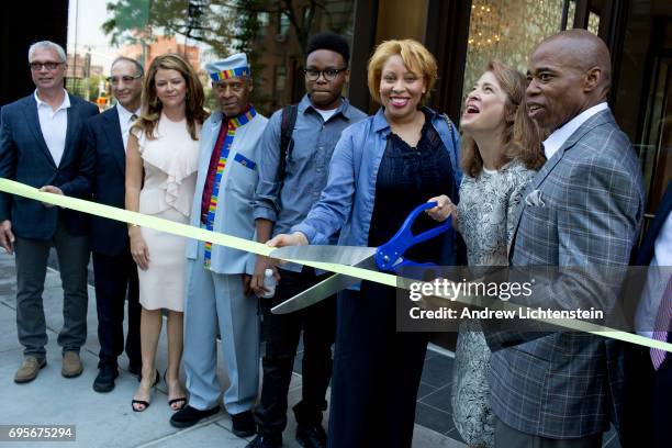 New tenant joins developers, city officials, and community leaders for a ribbon cutting ceremony for a new building in the Atlantic Yards development...