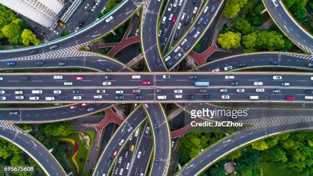 aerial view of shanghai highway - traffic stock pictures, royalty-free photos & images