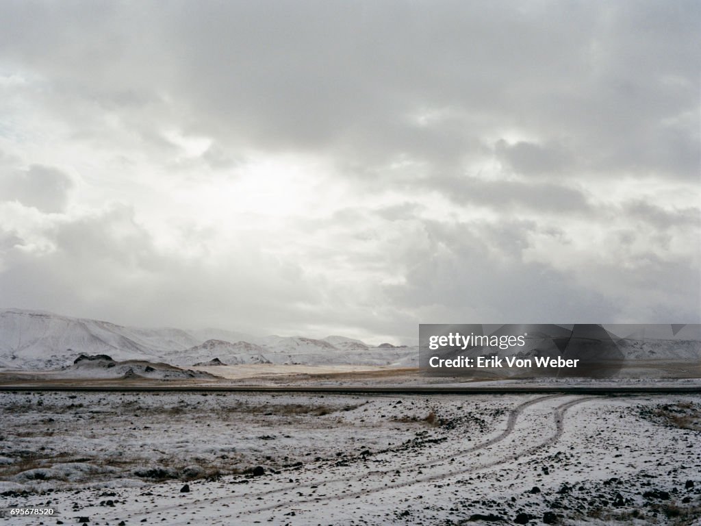 Icelandic landscape of snow covered road