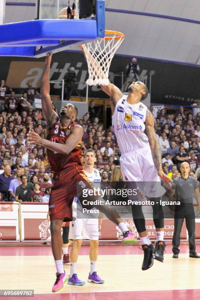 Melvin Ejim of Umana competes with Joao Gomes of Dolomiti during the match game 2 of play off final series of LBA Legabasket of Serie A1 between...