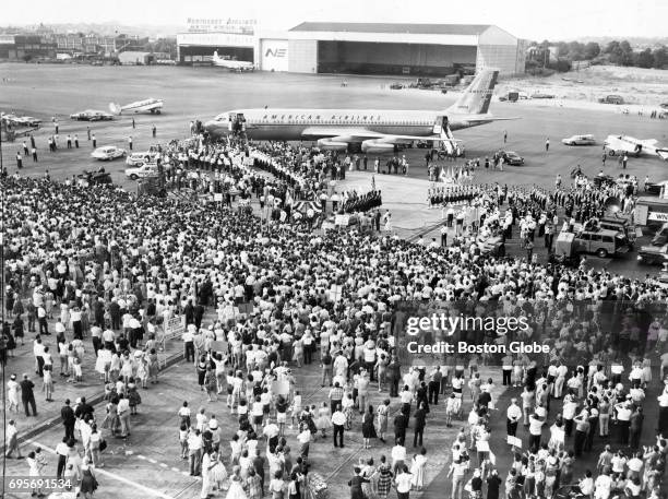 Sen. John F. Kennedy arrives at Logan Airport in Boston on July 17, 1960. The crowd welcomed him home and cheered him on after he became the...
