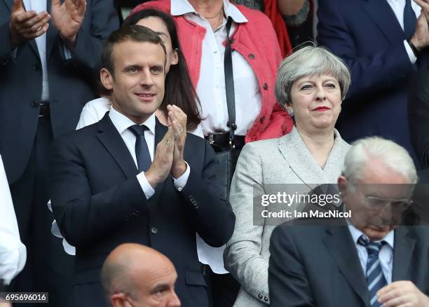 Emmanuel Macron and Theresa May are seen prior to the international Friendly match between France and England at Stade de France, on June 13, 2017 in...