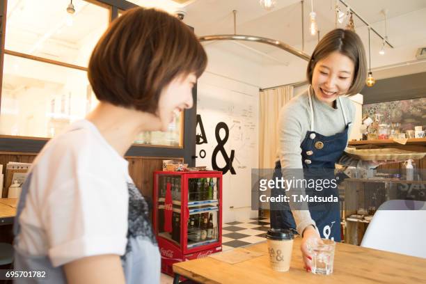 good friends talk in cafe - customer satisfaction ストックフォトと画像