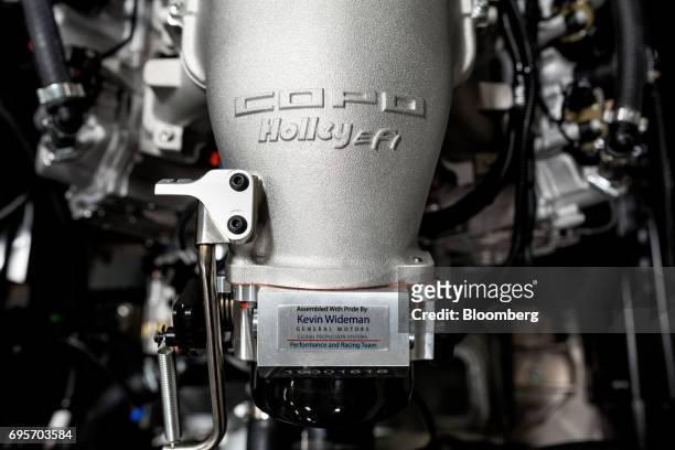 Holley Performance Products Inc. LS Hi-Ram intake manifold sits inside a General Motors Co. Chevrolet COPO Camaro at the company's build center in...