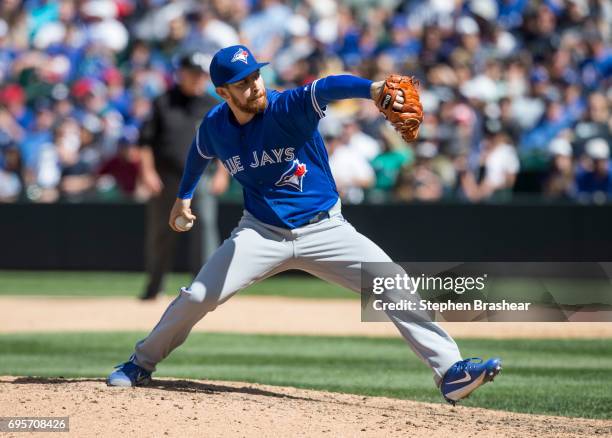 Reliever Danny Barnes of the Toronto Blue Jays delivers a pitch during the ninth inning of a game against the Seattle Mariners at Safeco Field on...