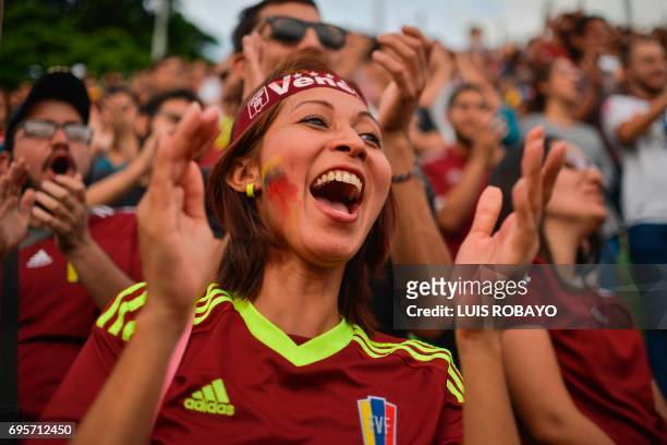 Football fans acclaim the Venezuelan Under-20 national team who was runner-up at the U-20 World Cup in South Korea, during a gathering to welcome...