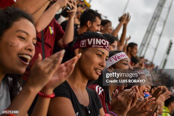 Football fans acclaim the Venezuelan Under-20 national team who was runner-up at the U-20 World Cup in South Korea, during a gathering to welcome...