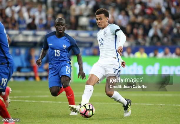 Golo Kante of France and Dele Alli of England during the international friendly match between France and England at Stade de France on June 13, 2017...