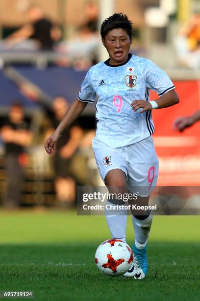 Kumi Yokoyama of Japan runs with the ball during the Women's International Friendly match between Belgium and Japan at Stadium Den Dreef on June 13,...