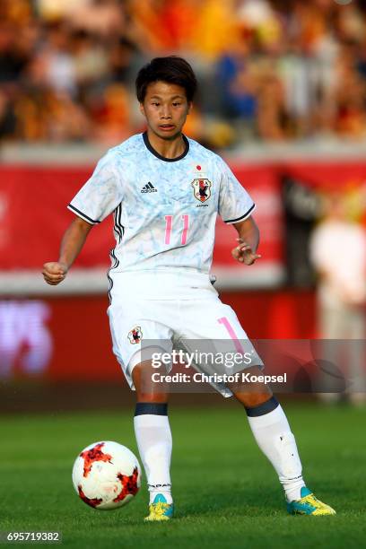 Mina Tanaka of Japan runs with the ball during the Women's International Friendly match between Belgium and Japan at Stadium Den Dreef on June 13,...