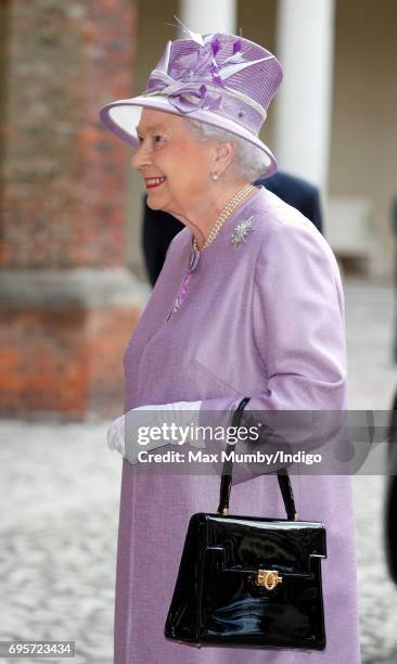 Queen Elizabeth II arrives to attend Evensong at the Chapel Royal Hampton Court Palace, to celebrate the Centenary of the founding of the Companions...