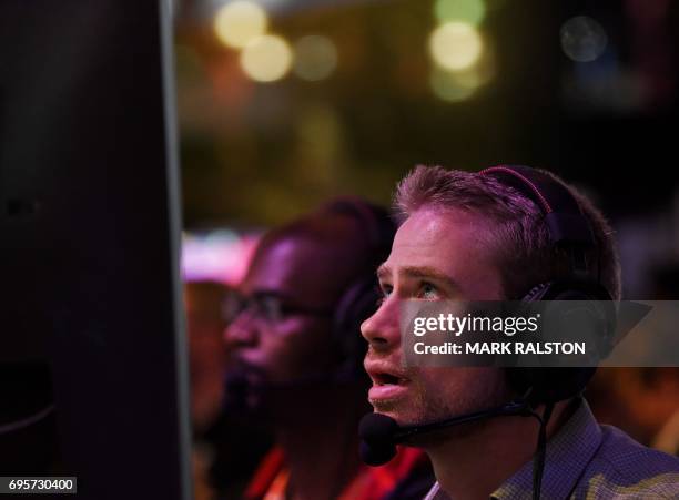 Gamers play the Ubisoft "Rainbow Siege" game at the Los Angeles Convention center on day one of E3 2017, the three day Electronic Entertainment Expo,...