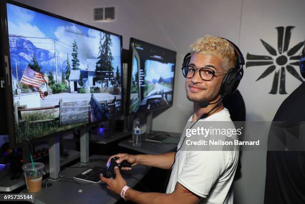 Jordan Fisher plays Far Cry 5 during E3 2017 at Los Angeles Convention Center on June 13, 2017 in Los Angeles, California.