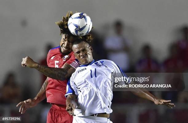 Panama's defender Roman Torres vies for the ball with Honduras' Rony Martinez during a FIFA World Cup Russia 2018 Concacaf qualifier match in Panama...