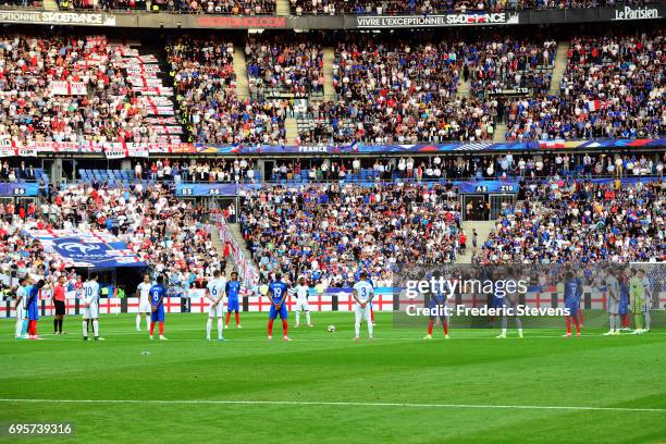 Players and fans respect one minute of silence in honnor of attacks in England before the International Friendly match between France and England at...