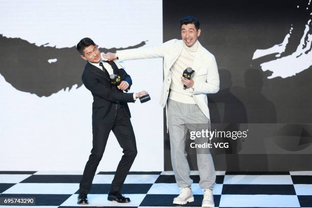 Actor and singer Aaron Kwok Fu-shing , actor Wang Qianyuan attend a press conference of director Yi-chi Lien's film 'Peace Breaker' on June 13, 2017...