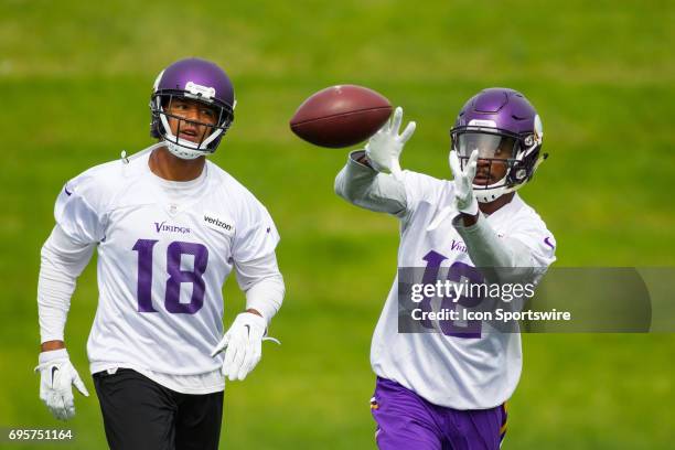 Minnesota Vikings wide receiver Rodney Adams catches a pass while wide receiver Michael Floyd defends during the Vikings Minicamp at Winter Park on...